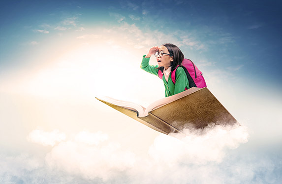 Girl flying on Book