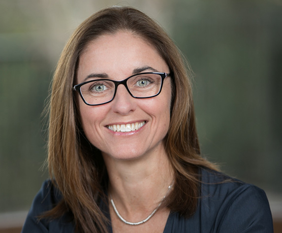 Dr Carolyn Mee on a nature background