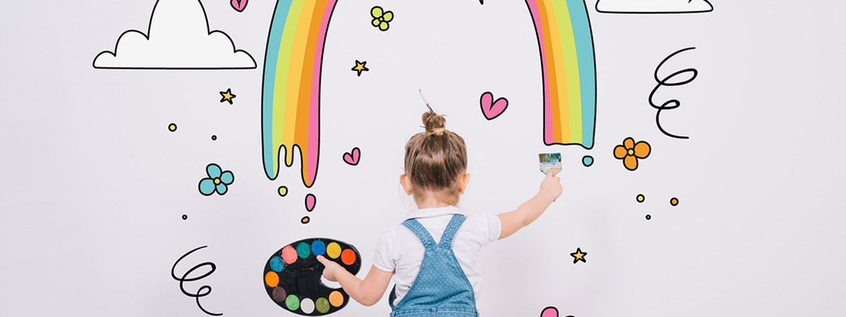 girl painting on wall