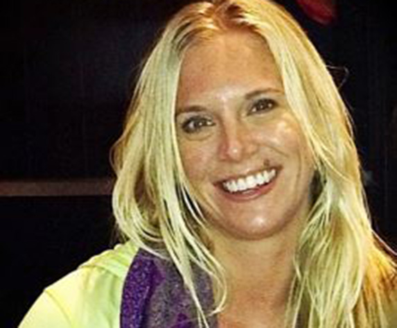 Tanya Hallman on a dark background
