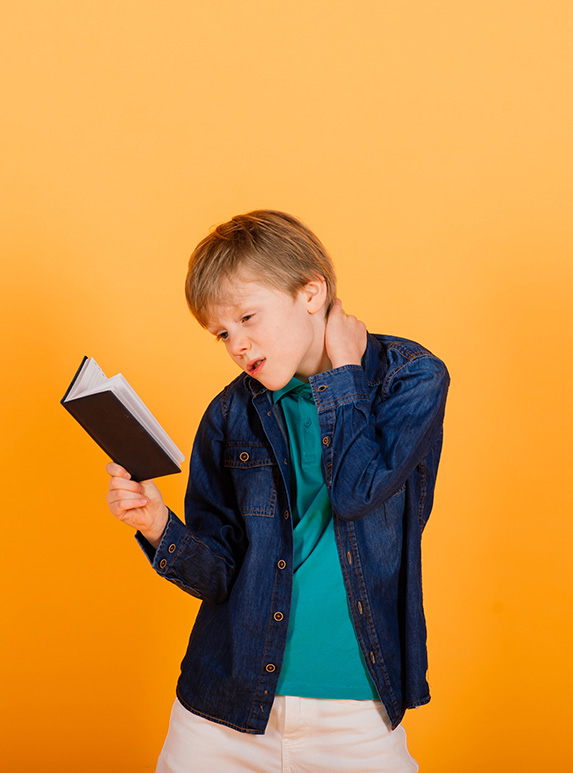 Child with book in hand